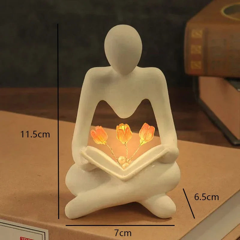 Elegance Illuminated: Abstract Figure Statue Lamp for Stylish Table Decor