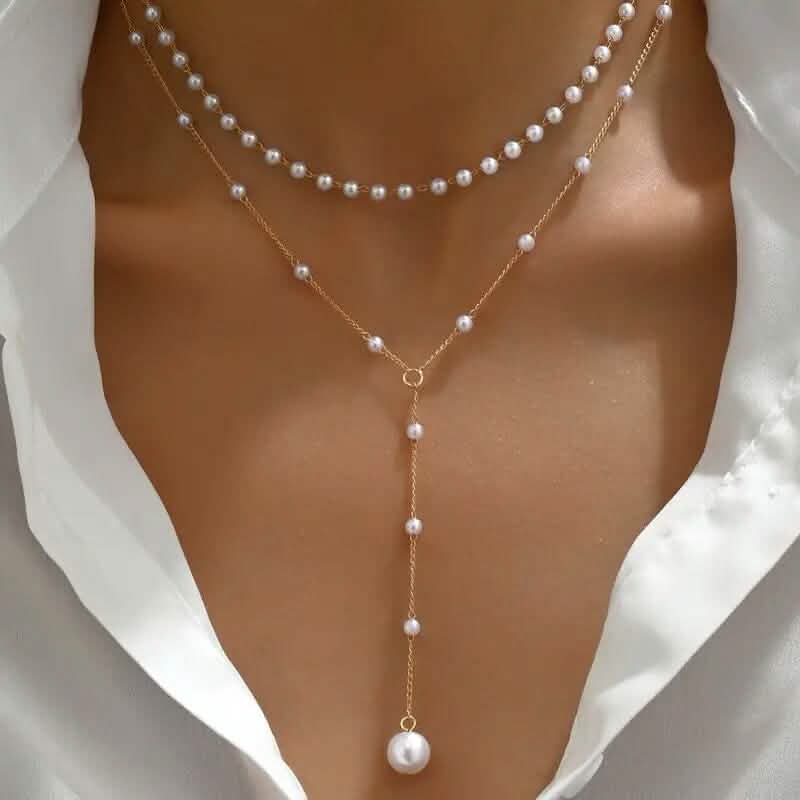 Elegant Vintage Style Double-Layer Pendant Necklace with Imitation Pearl Accents and Tassel Drop