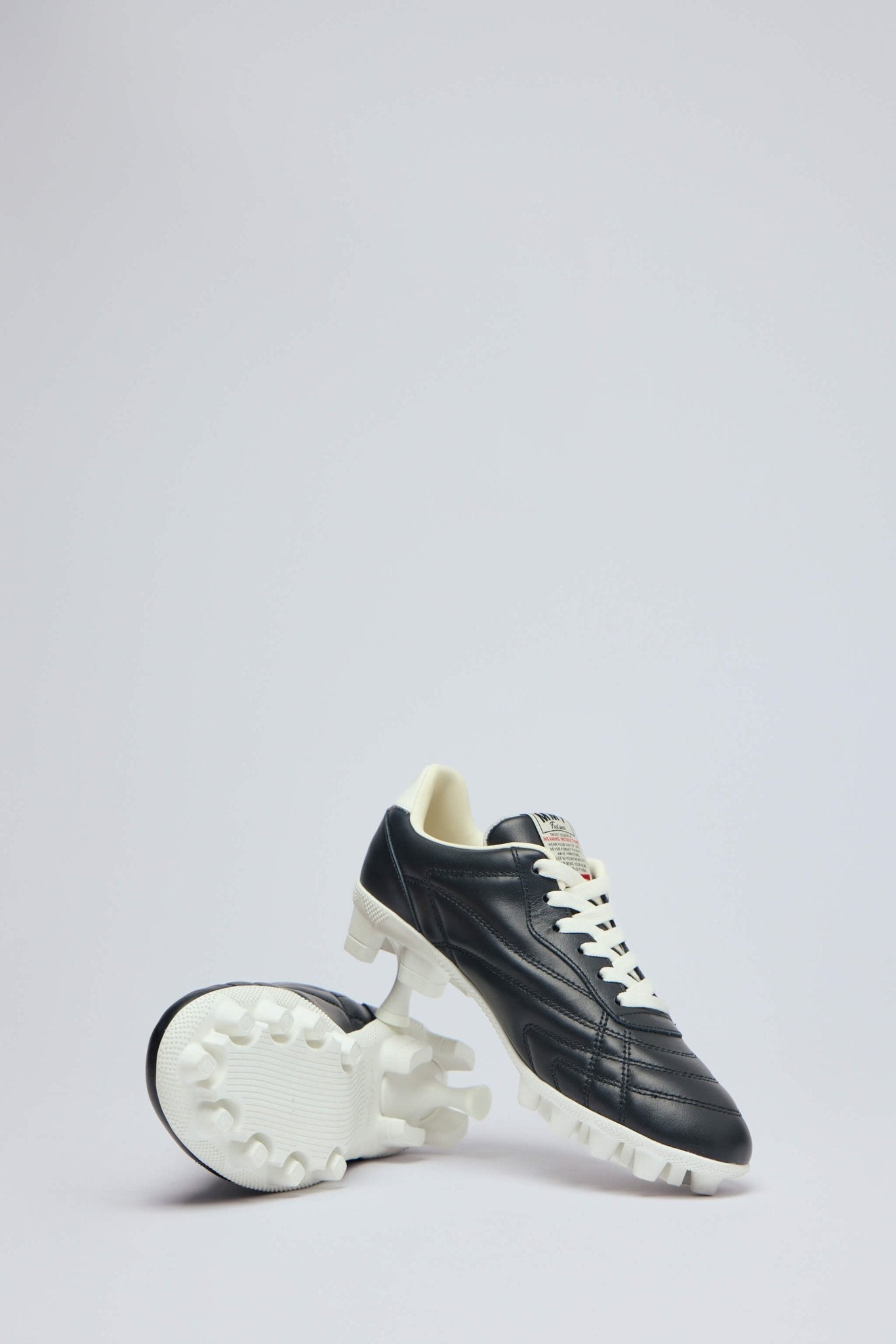 Spike Sole Sneaker Pumps