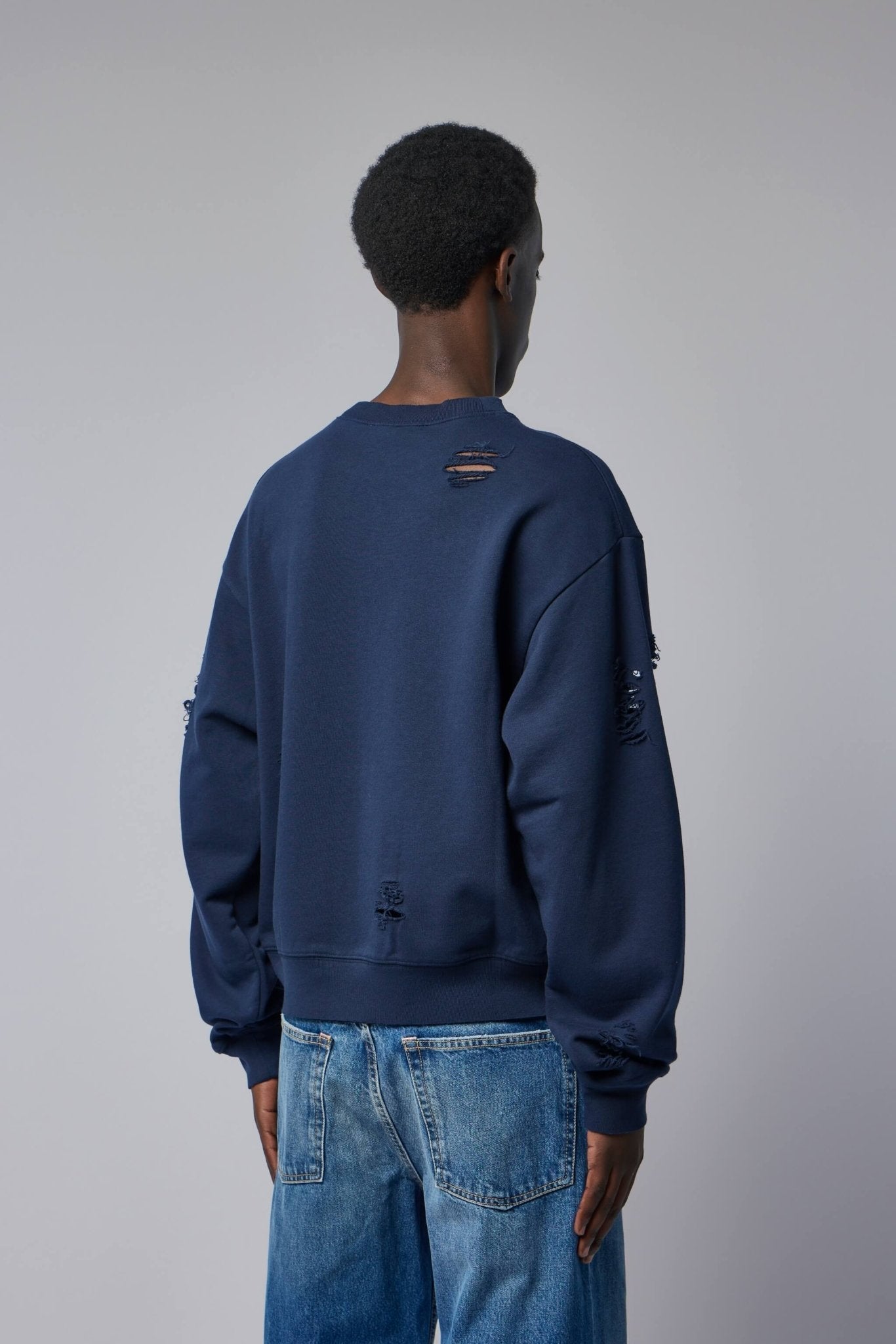 Distressed Fleece Sweatshirt