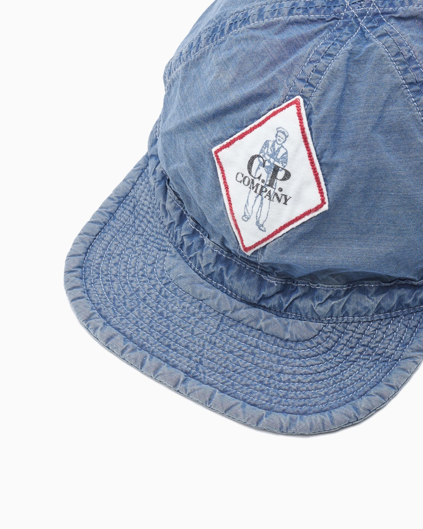 Gorra CP Company 50 Fili Indigo Bleached Unisex