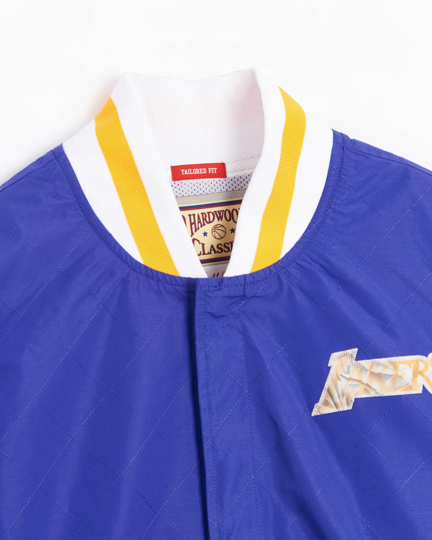 Chaqueta Mitchell & Ness 75th Anniversary Los Angeles Lakers Men's Warm Up Jacket para hombre