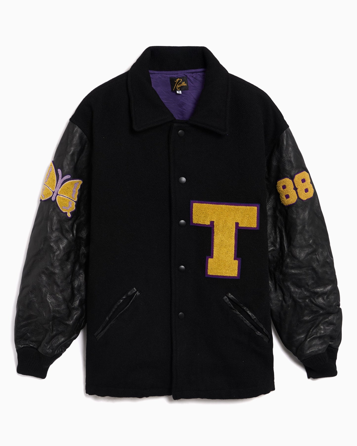 Varsity con gráfico Relaxed Needles Lettered para hombre