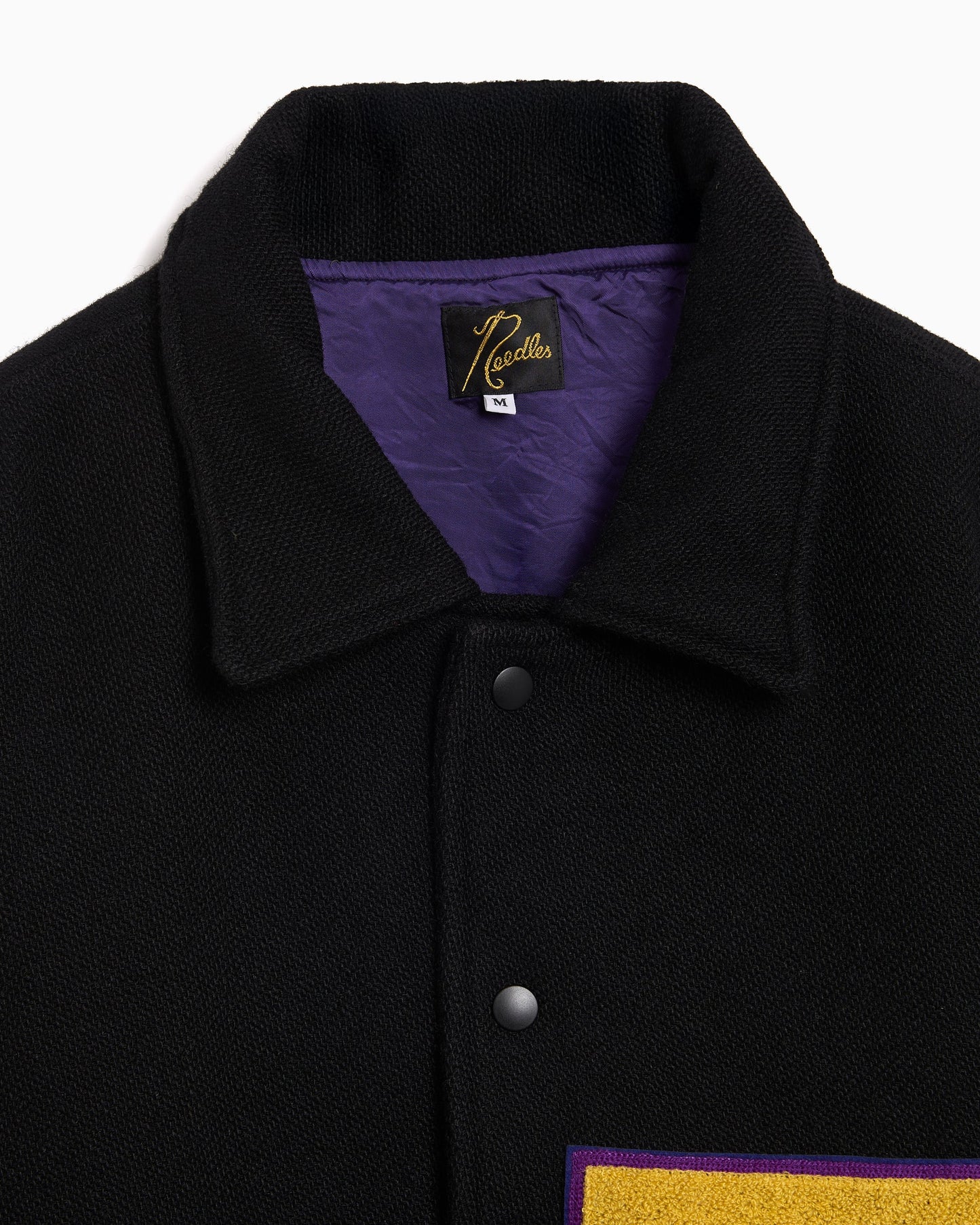 Varsity con gráfico Relaxed Needles Lettered para hombre