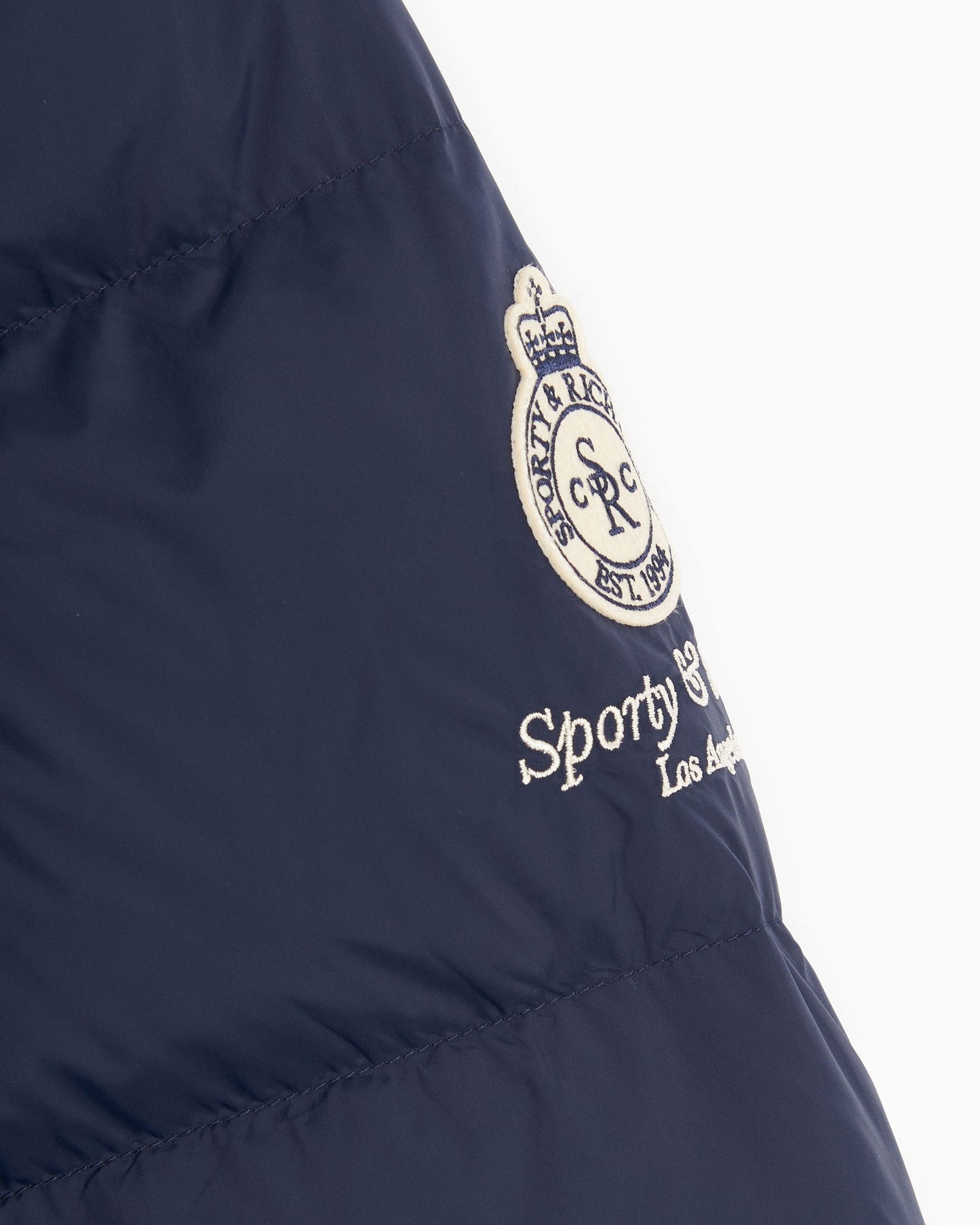 Chaqueta de plumas Sporty & Rich Crown LA Unisex Puffer Jacket Unisex