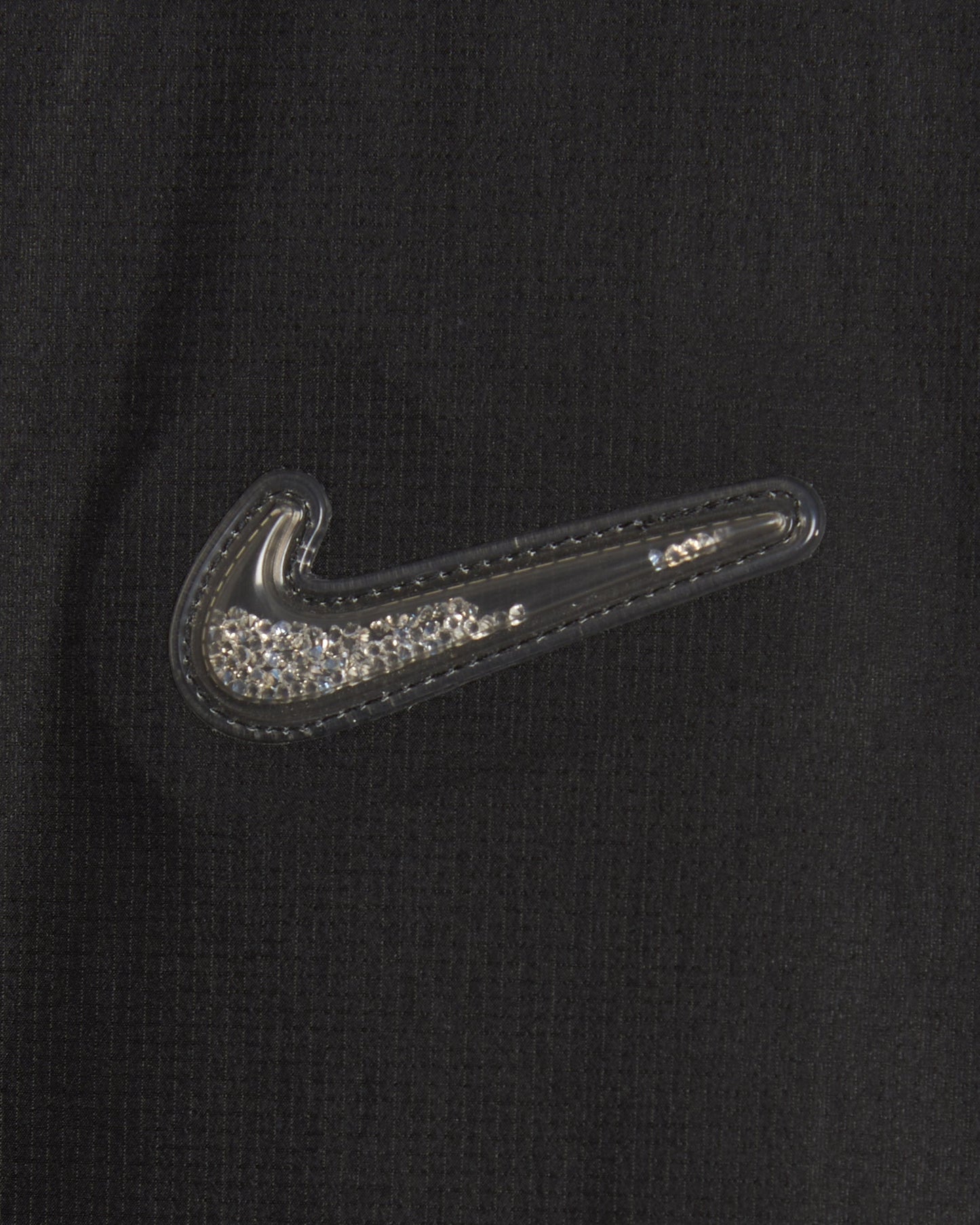Chaqueta x Drake NOCTA Nike x Drake NOCTA NRG Swarovski® Swoosh Unisex Jacket Unisex