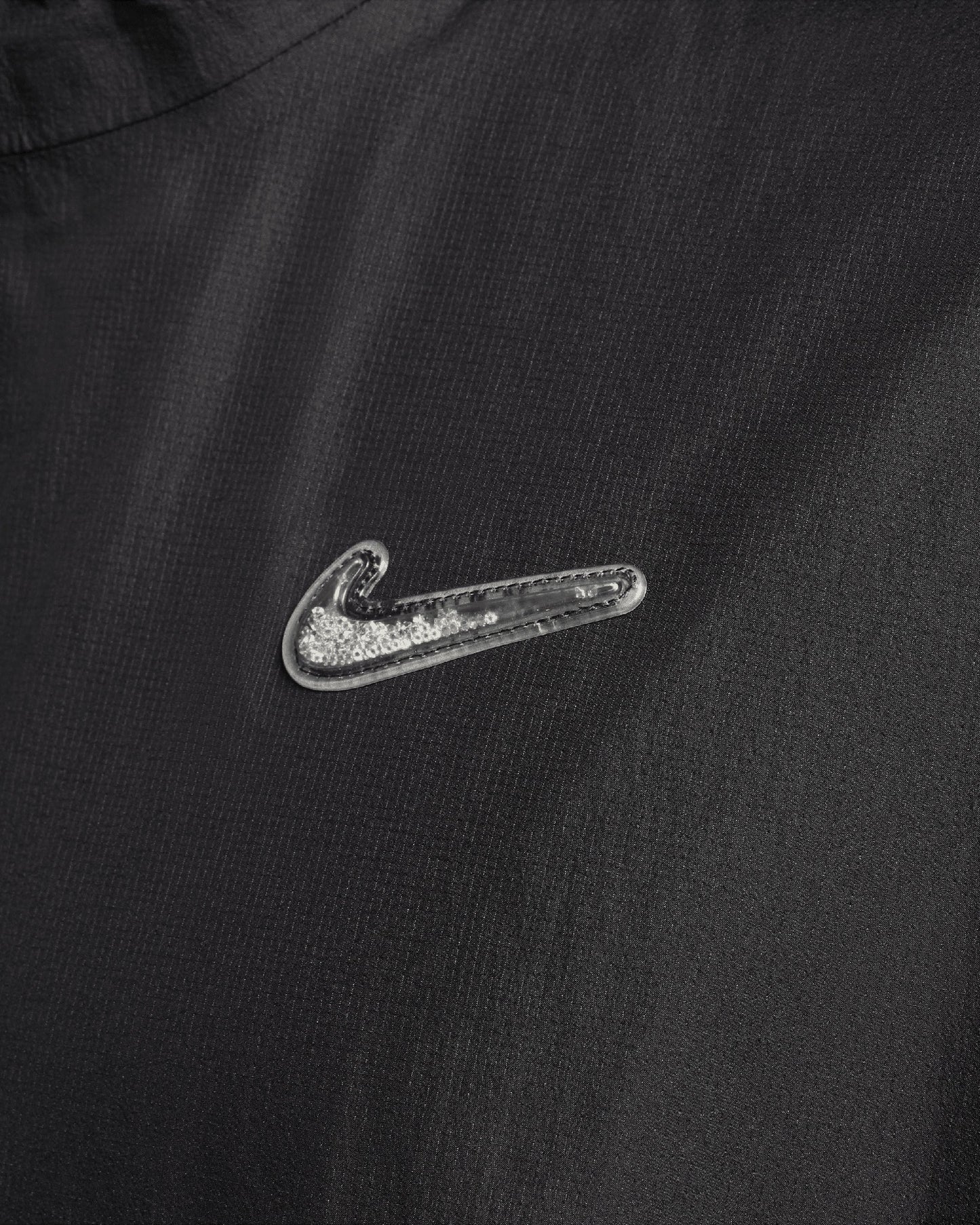 Chaqueta x Drake NOCTA Nike x Drake NOCTA NRG Swarovski® Swoosh Unisex Jacket Unisex
