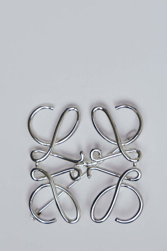 Anagram Brooch in Metal