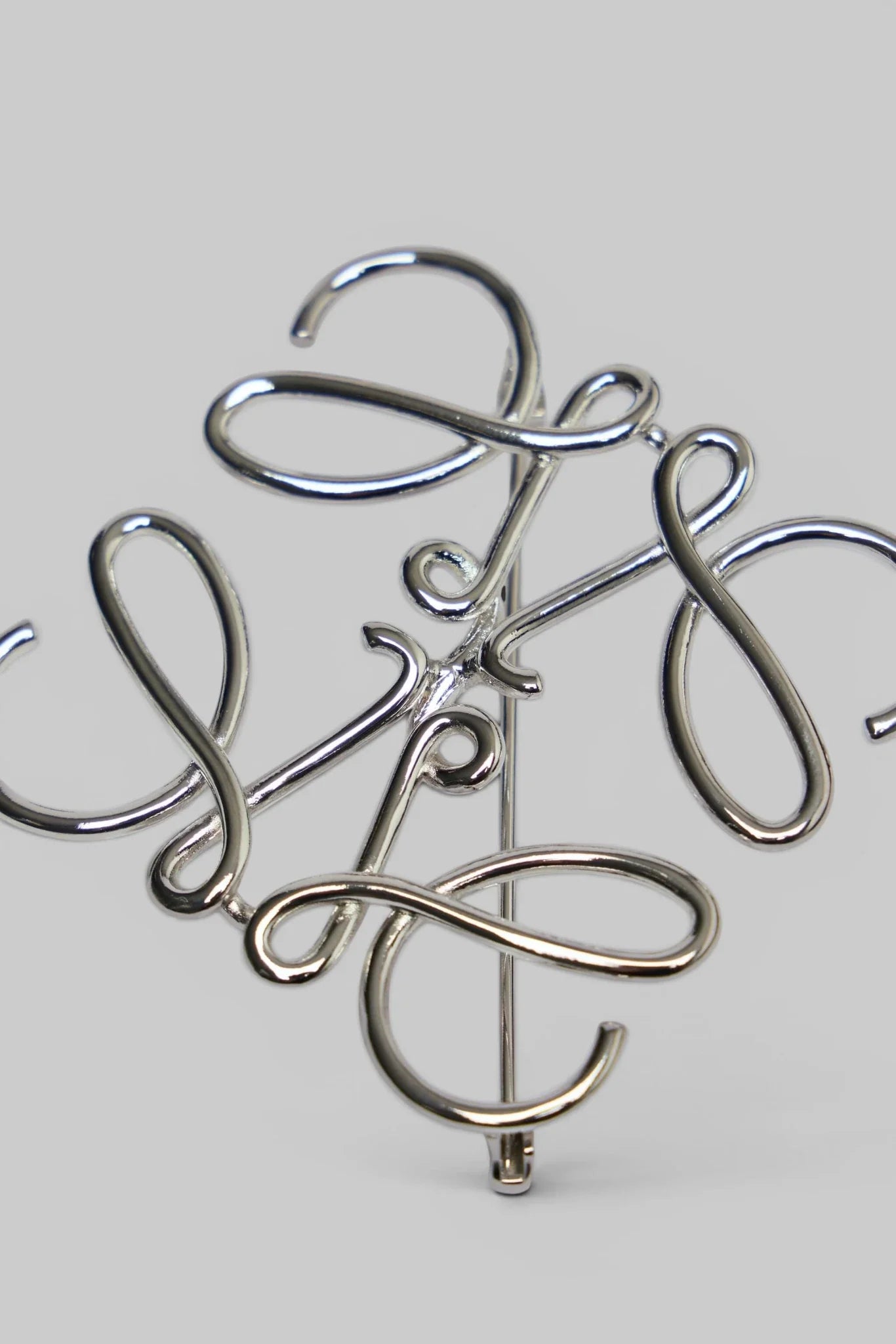 Anagram Brooch In Metal