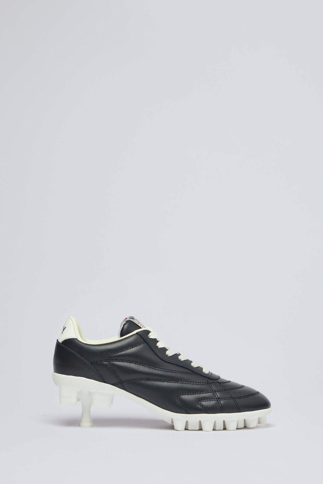 Spike Sole Sneaker Pumps