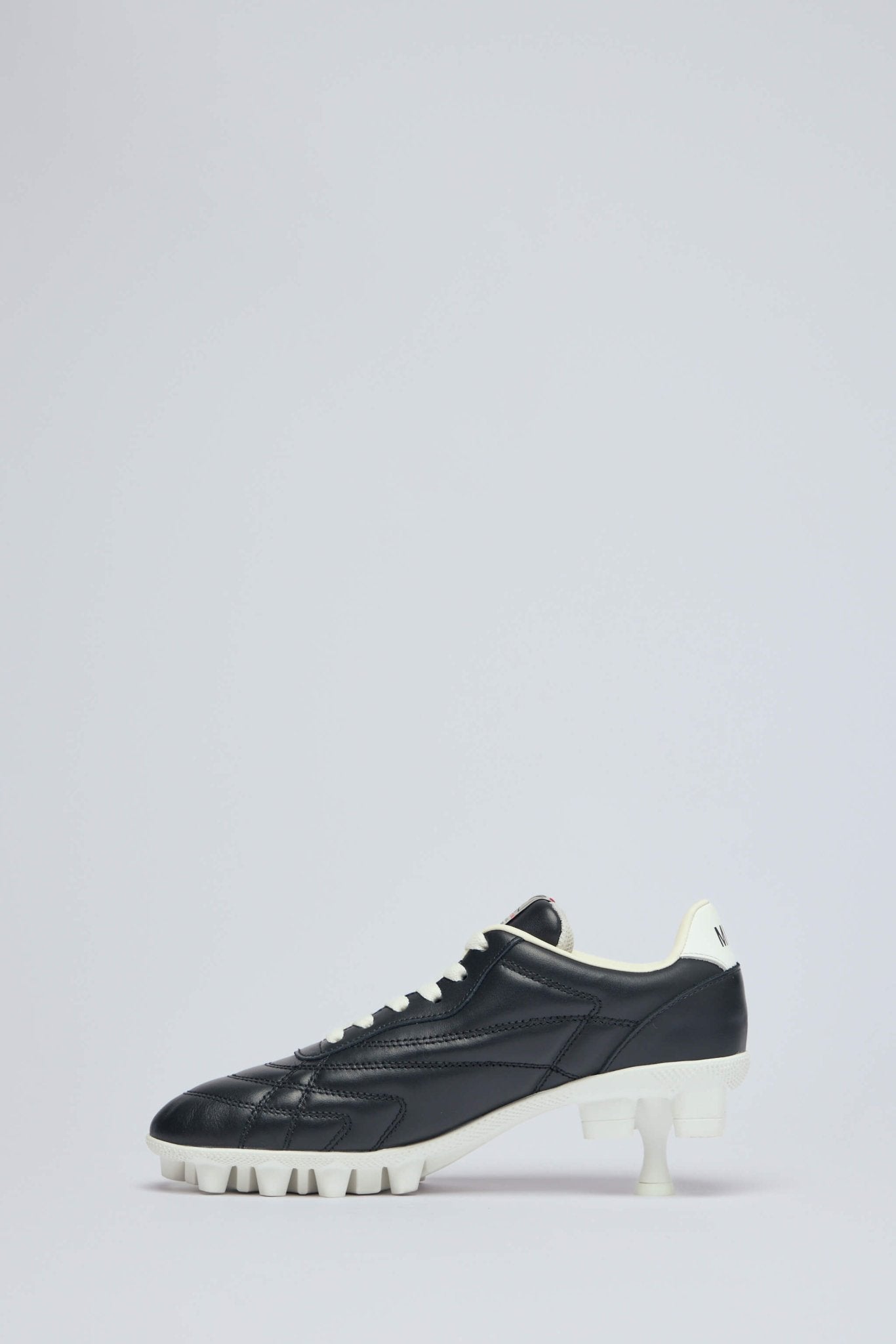 Spike Sole Sneaker Pumps