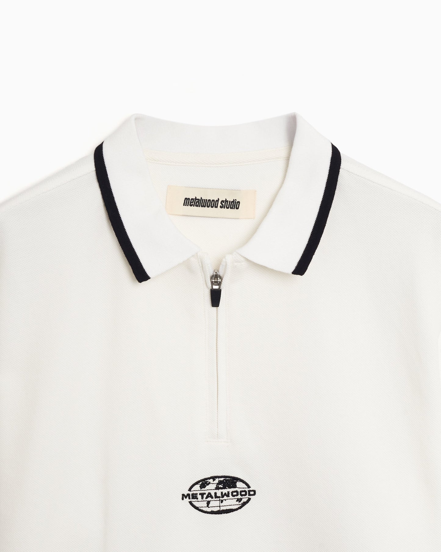 Polo Zip-Up Metalwood Studio World Class para hombre
