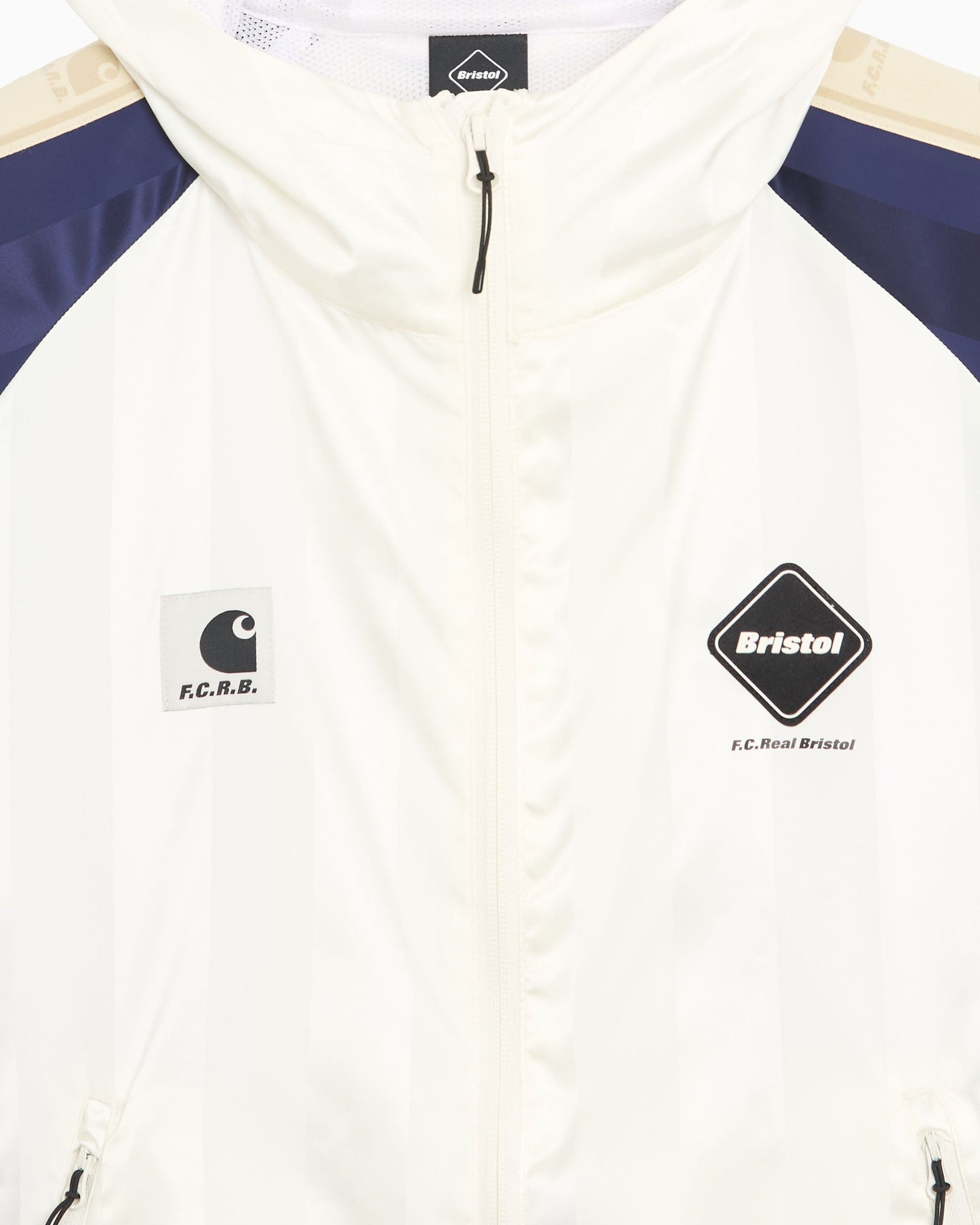 Sudadera con cremallera de rayas Carhartt WIP x F.C. Real Bristol Warm Up Unisex