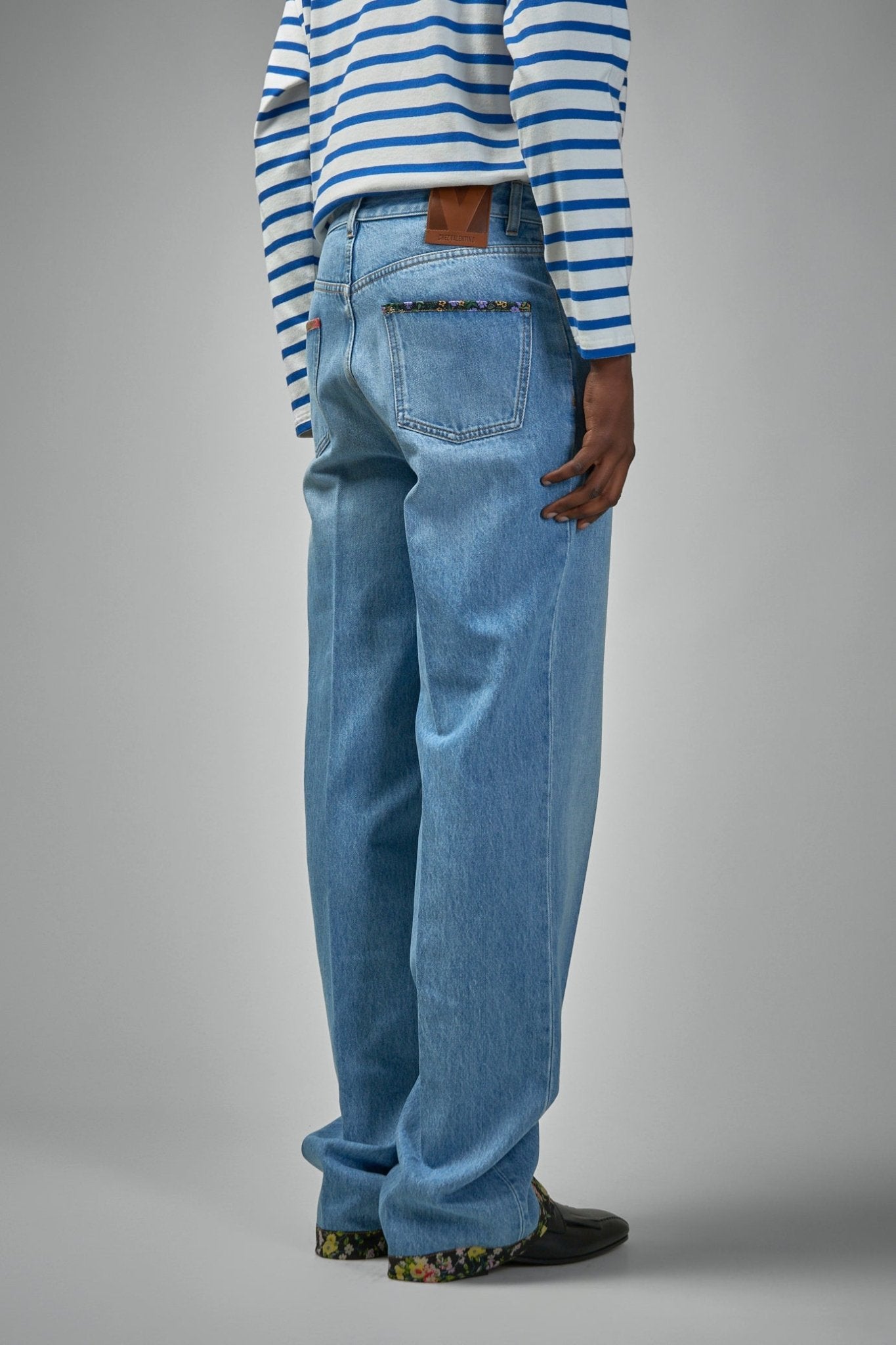 Denim Trousers with Floral Print Hem